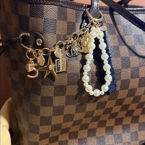 CHANEL Gold Camellia & Star Perfume Bottle Charm Keychain